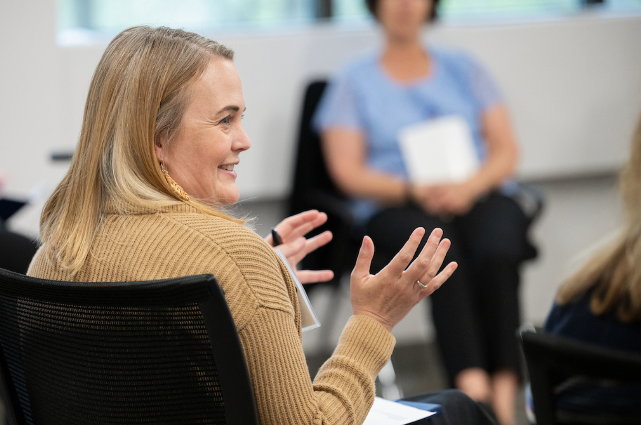 women sitting in a classroom