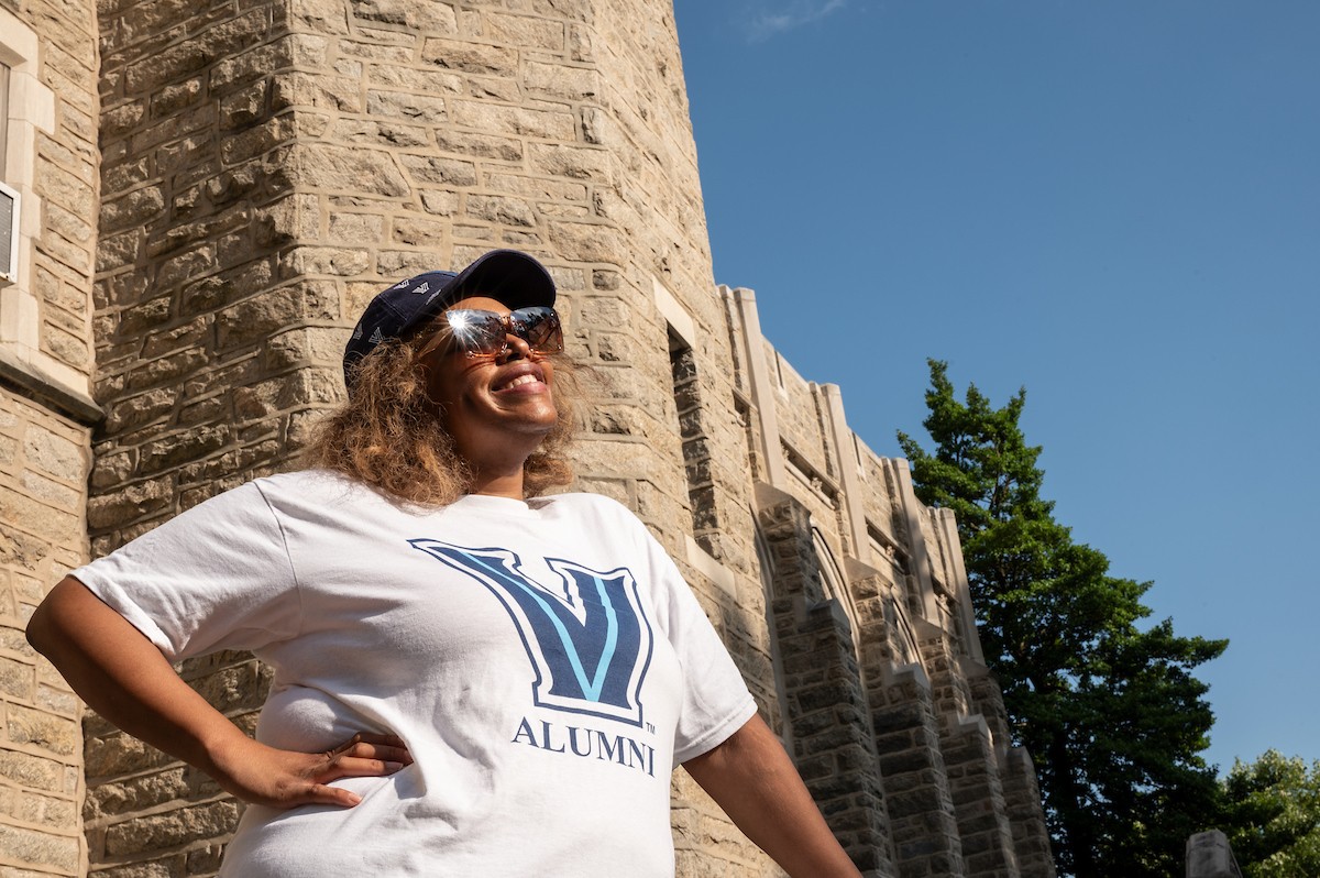 Alumni looking up to the sky