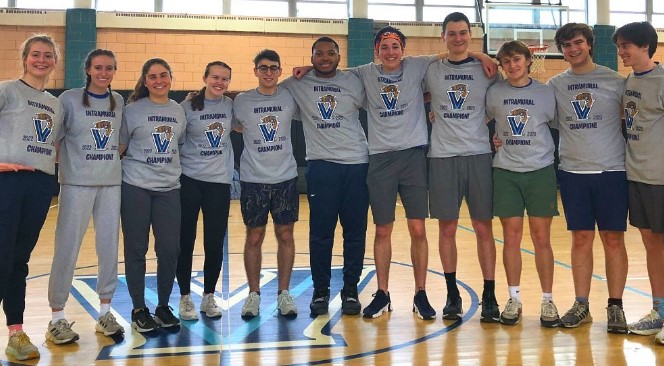 Students posing for handball champion photo