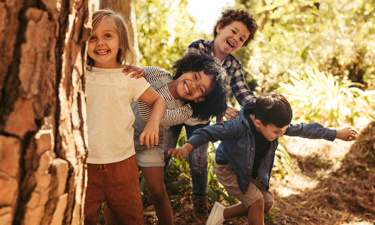 Four children playing outside