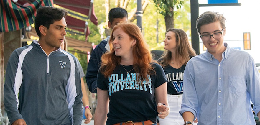 Group of students walking in town