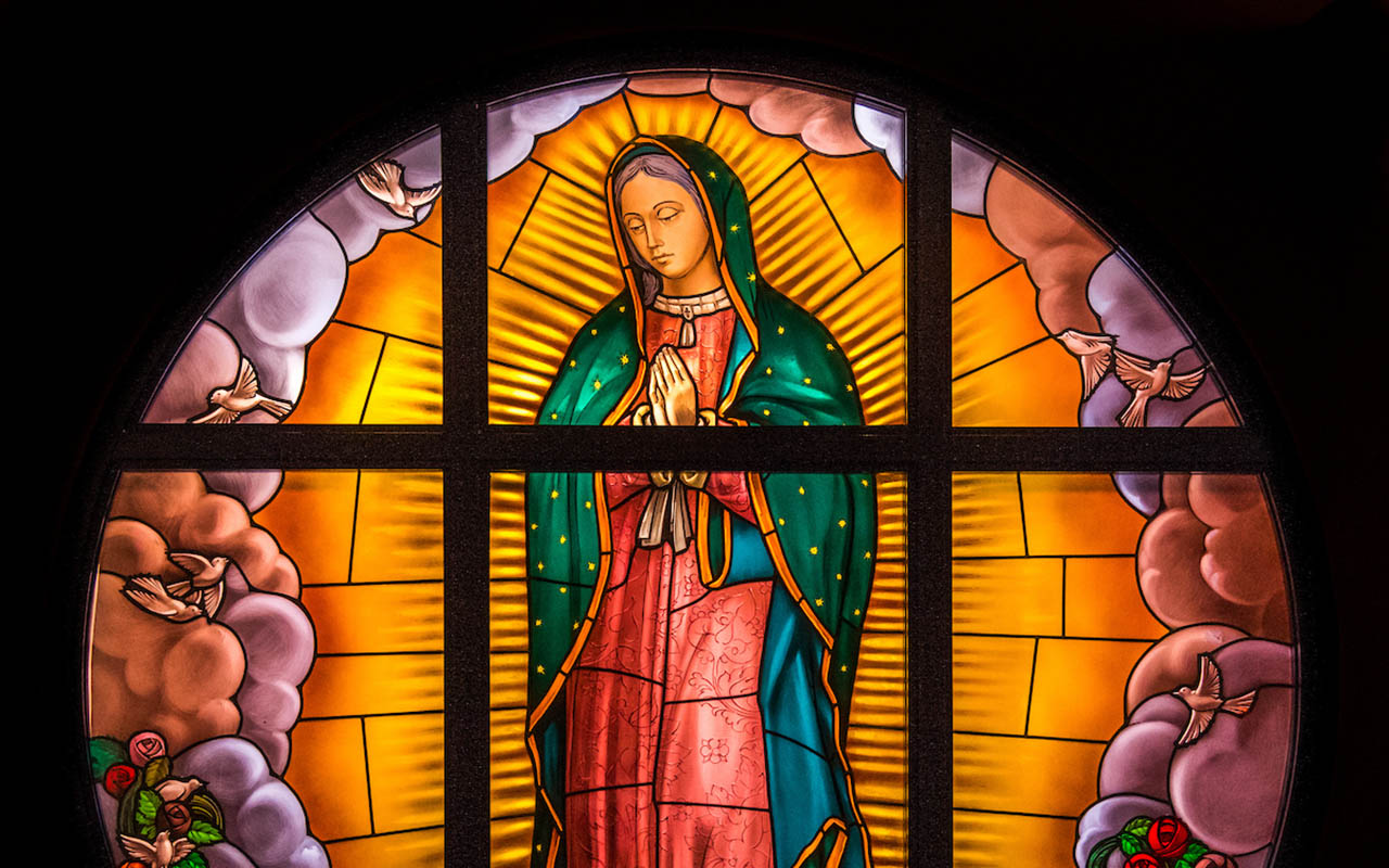 Image of stainglass inside the Chapel of our Lady, Mirror of Justice