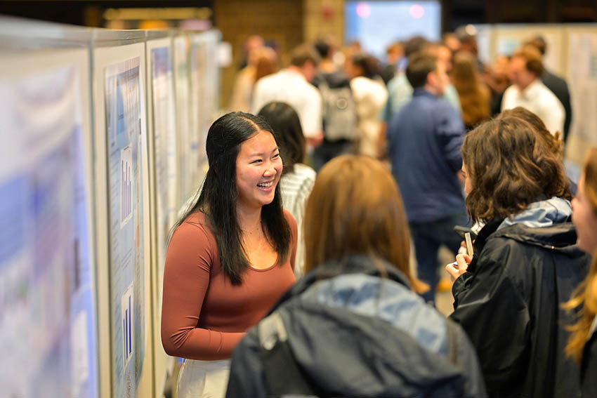 Student discussing a research project.